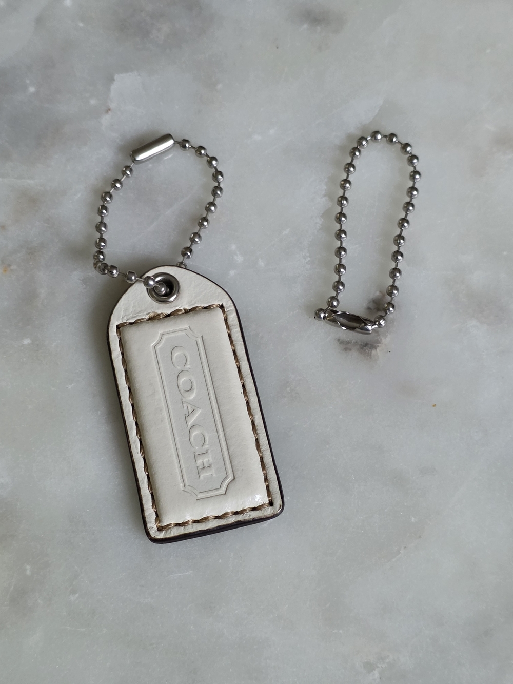 COACH Small White Leather Hangtag W/ Silver Grommet And Chains